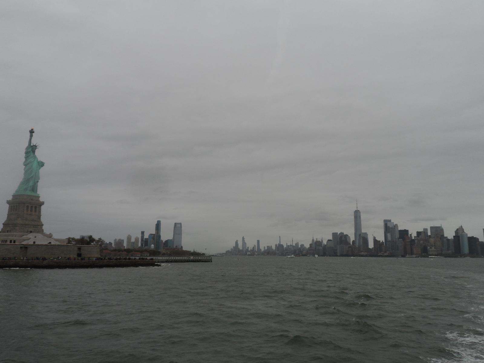 While riding the ferry to Liberty Island, looking back at the Statue of Liberty and South Manhattan; photo credit: Katherine Michel
